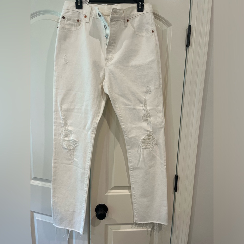 Levi’s 501 distressed raw hem jeans 29/32